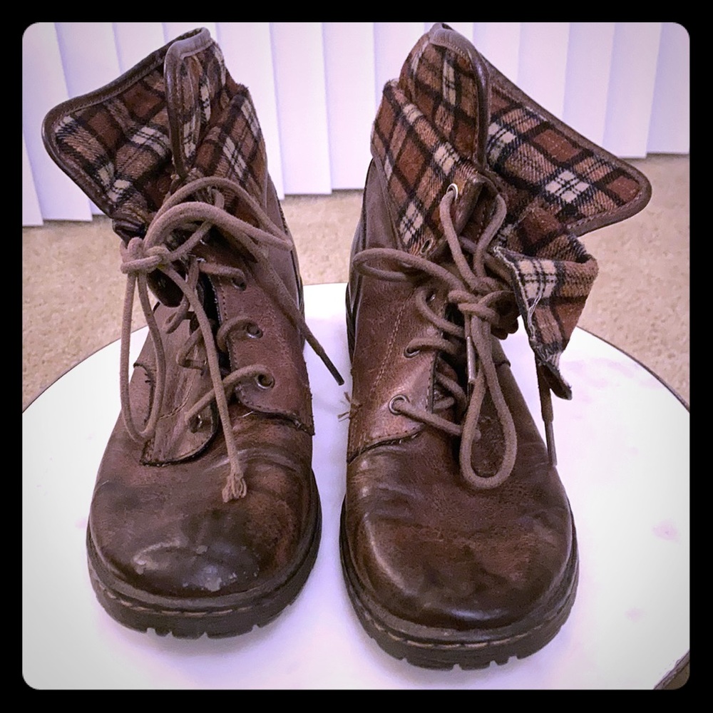 Women’s distressed combat boots.